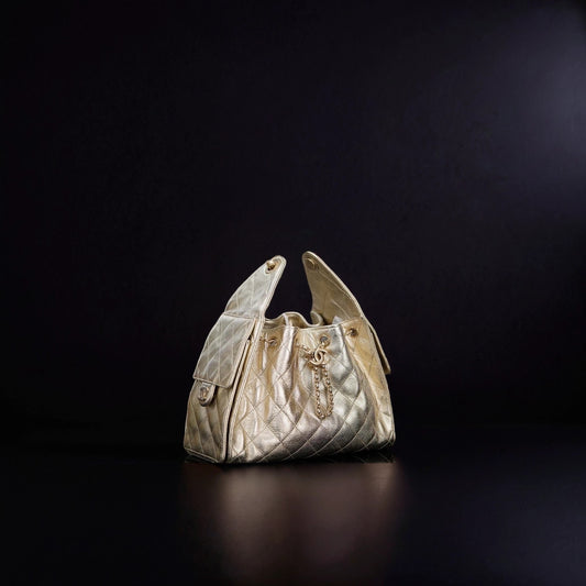 Metallic Caviar Quilted Small Chanel 25 Handbag Gold